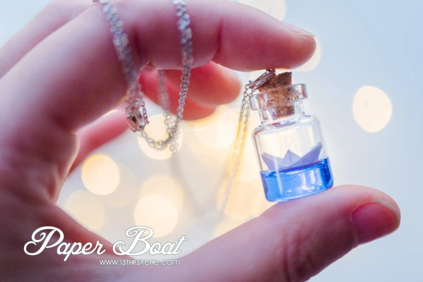 Sterling silver paper boat bottle necklace