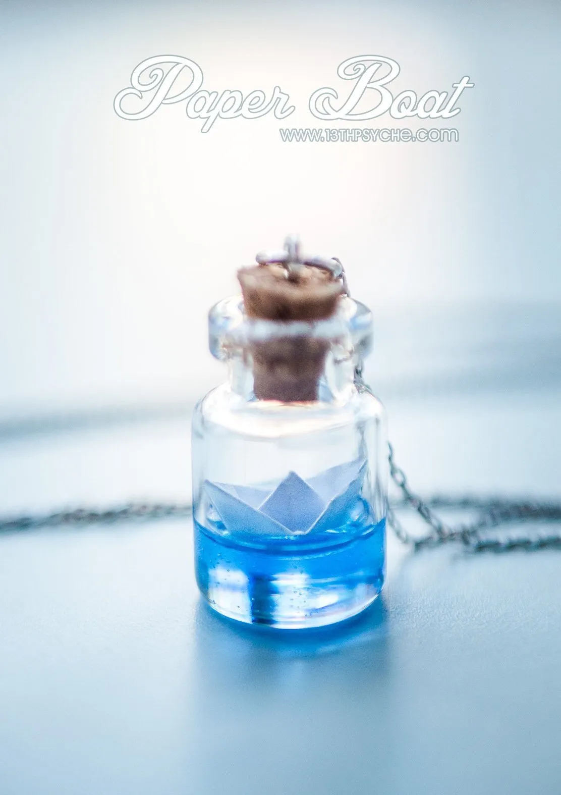 Sterling silver paper boat bottle necklace