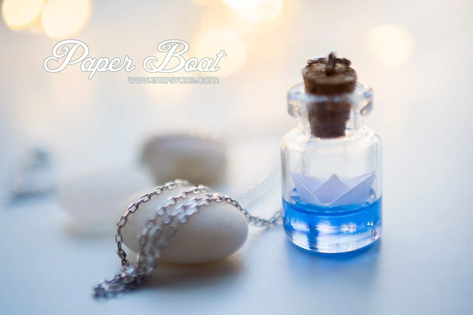 Sterling silver paper boat bottle necklace